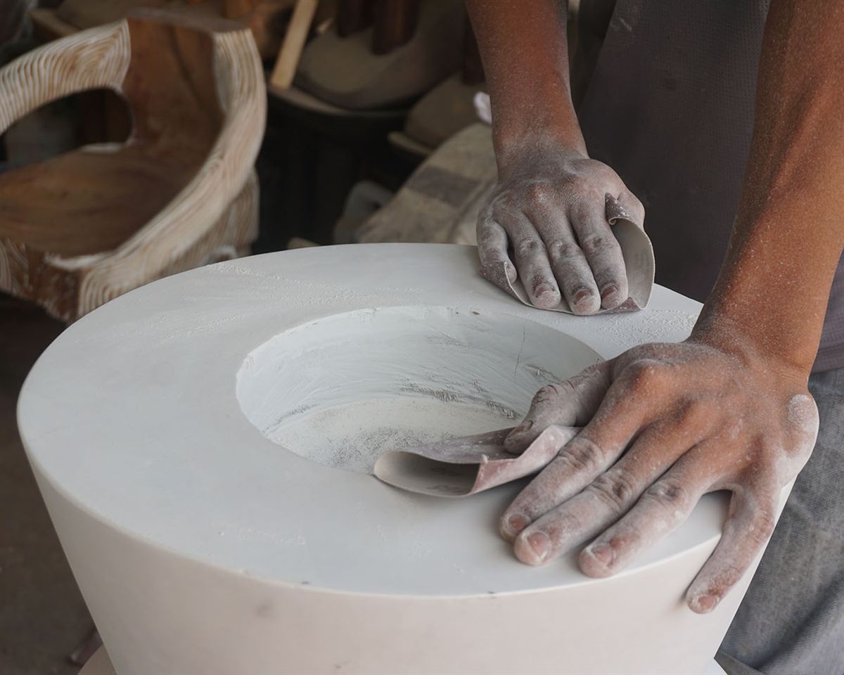 Hand-finishing a limestone vessel